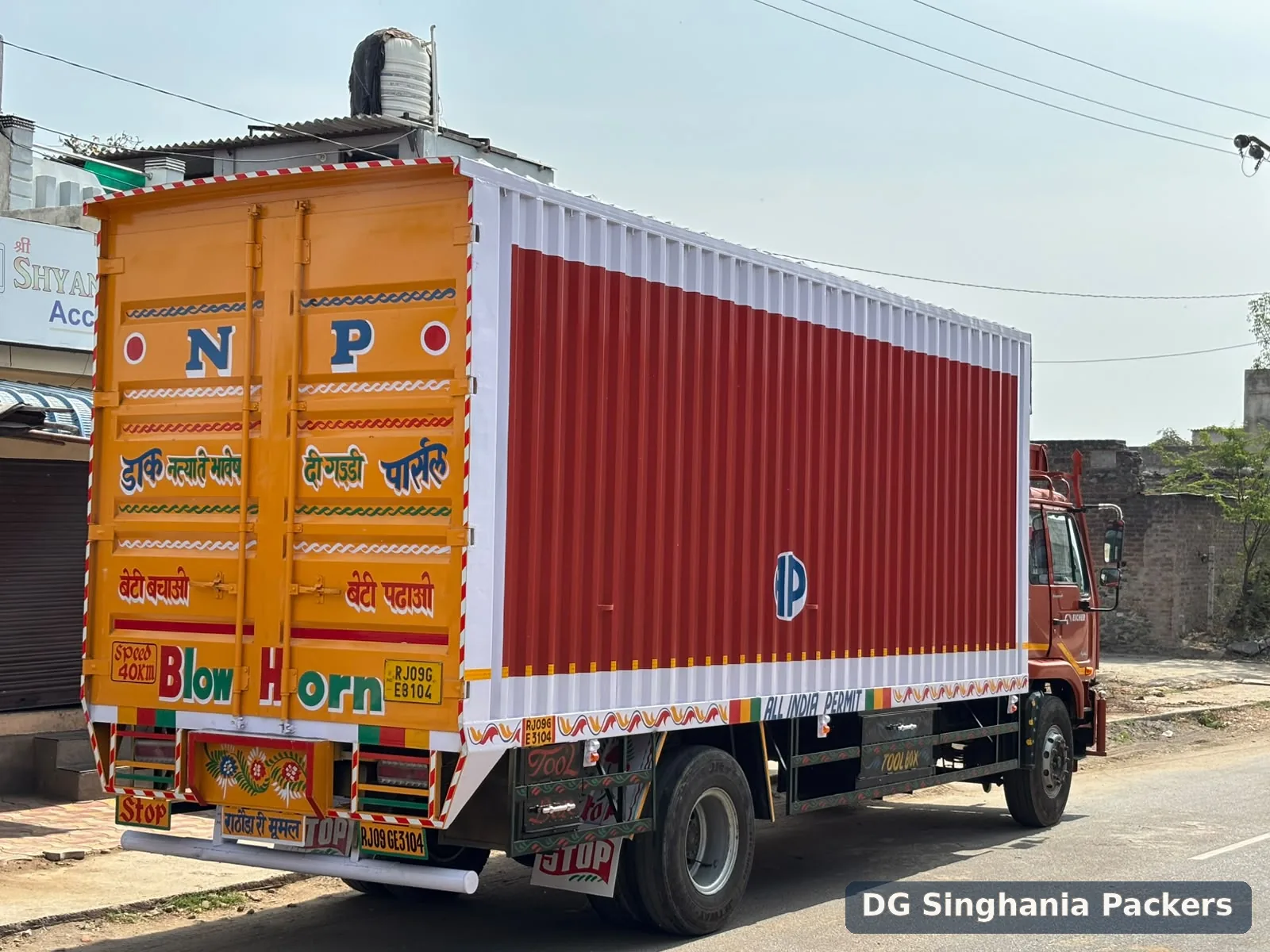 Covered goods transport truck used for shifting services in Pune